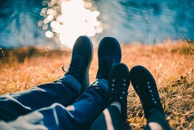 Low section of couple on field