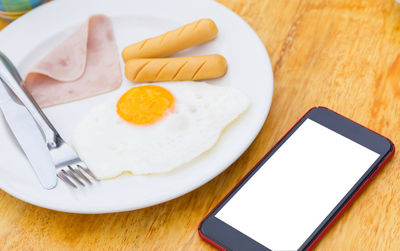 High angle view of breakfast served on table