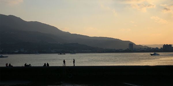 Scenic view of mountains at sunset