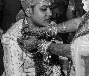 Close-up of female friends wearing mask