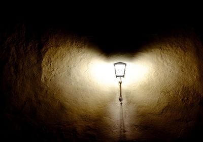 Illuminated lamp in dark room