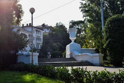 Street and buildings against sky