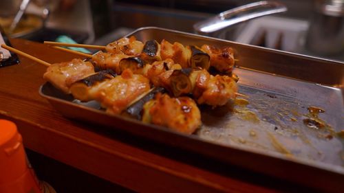 High angle view of meat on barbecue grill