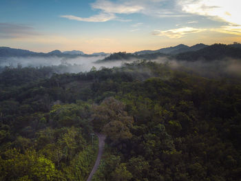 Scenic view of landscape against sky during sunset