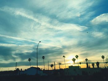 Low angle view of cloudy sky at sunset