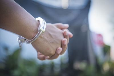 Close up. hands are handcuffed. captured prisoner or terrorist, close-up of hands in handcuffs.