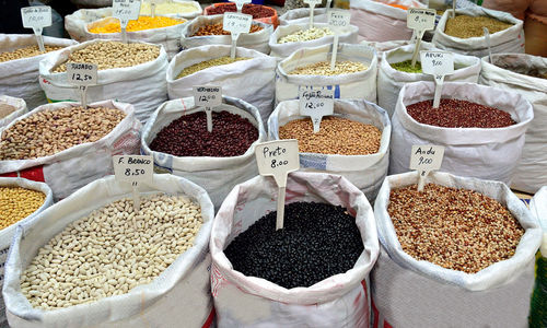 Full frame shot of various food in sacks for sale at market