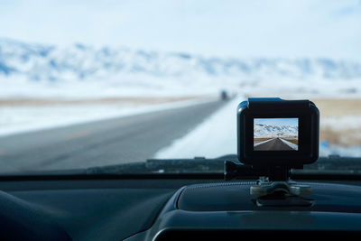 Camera on dashboard in car