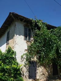 Low angle view of house against clear sky