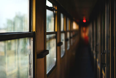 Close-up of train looking through window