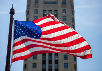 American flag against building in city