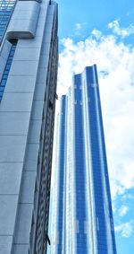 Low angle view of modern buildings against sky