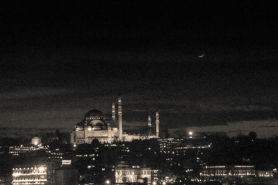 Illuminated cityscape at night