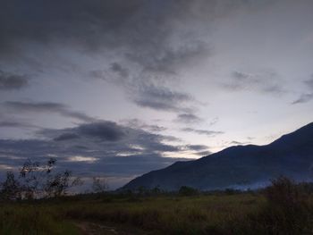 Scenic view of landscape against sky during sunset