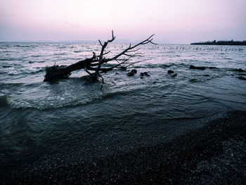 Scenic view of sea against sky during sunset