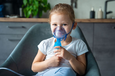 Young woman drinking water