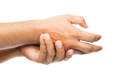 Cropped hands against white background