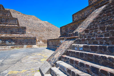 View of old ruin building against blue sky