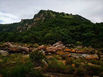 Scenic view of rocky mountains against sky