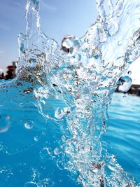 Close-up of water splashing in sea