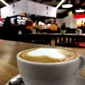 Close-up of cappuccino on table