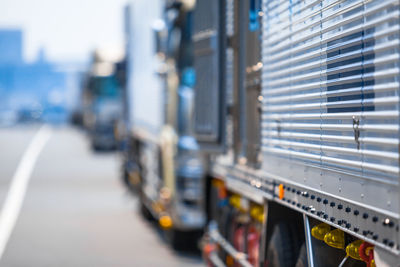 Defocused image of trucks on road