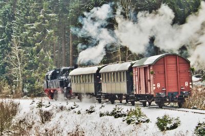 Train on railroad tracks during winter