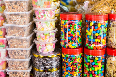 Stack on candies for sale in shop