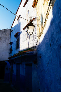 Low angle view of window on old building