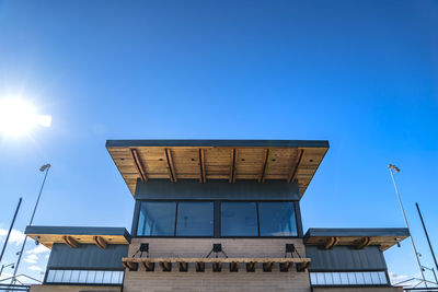 Low angle view of building against blue sky