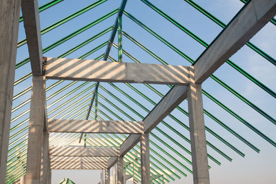 Low angle view of metallic structure against sky