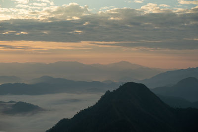 Scenic view of mountains against sky during sunset