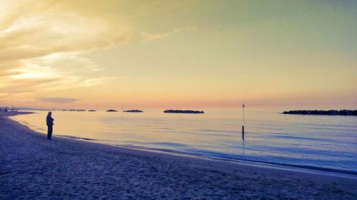 Scenic view of sea at sunset