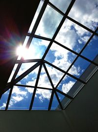 Low angle view of sky seen through window