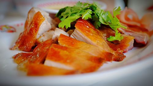 Close-up of roasted duck meat served in plate