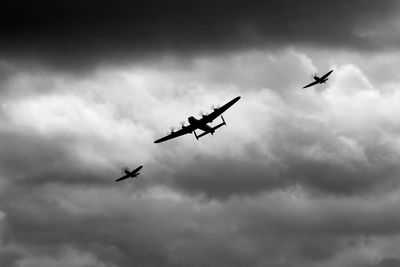 Low angle view of battle of britain memorial flight over bournemouth