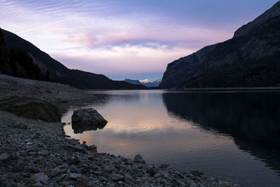 Scenic view of lake against sky during sunset