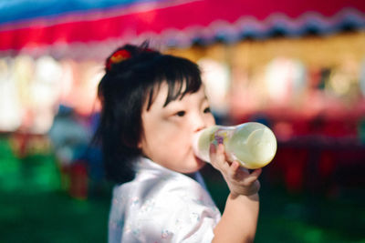 Young woman drinking milk