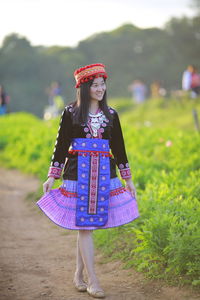 Woman standing on field