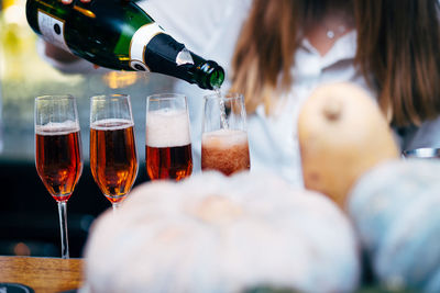 Pouring and serving champagne in a luxury social events like weddings and party.