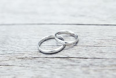 Close-up of rings on wooden table