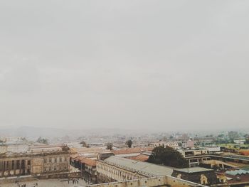 Aerial view of city in foggy weather