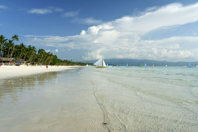 Scenic view of beach against sky