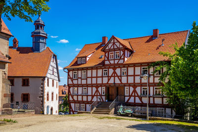 Buildings against blue sky