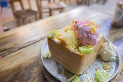 High angle view of cake in plate on table