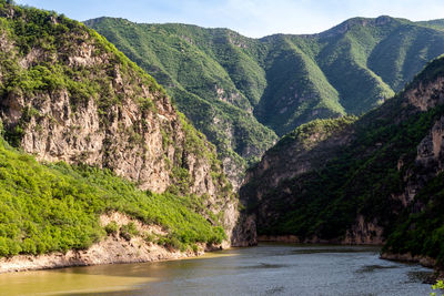 Scenic view of sea and mountains