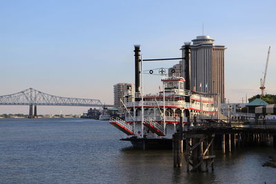 Bridge over river against clear sky
