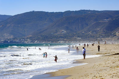 People enjoying the beach at santa monica, california