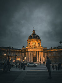 Low angle view of cathedral against cloudy sky