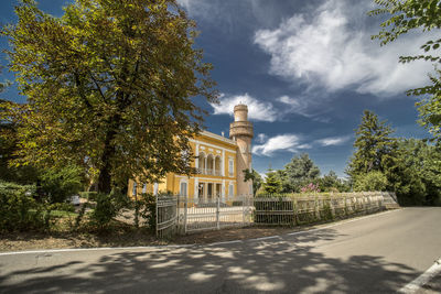 View of building against cloudy sky